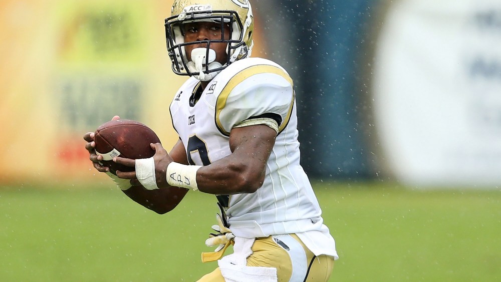 Running back Tony Zenon #9 of the Georgia Tech Yellow Jackets runs with the ball during the game against the North Carolina Tar Heels, Sept. 21, 2013.