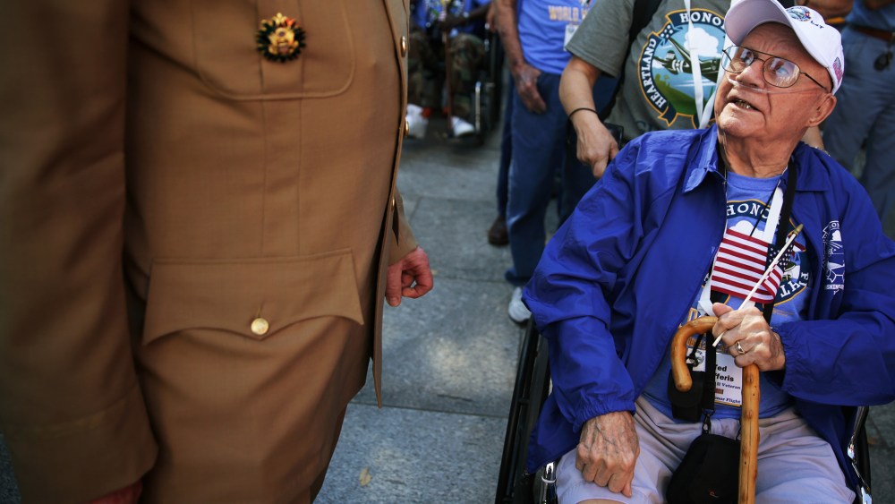 World War II veteran Ted Jafferis (R) visits the World War II Memorial, October 2, 2013.