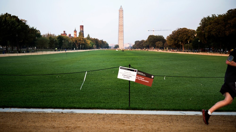 A man runs through a closed National Mall in Washington, DC, Oct 3, 2013.