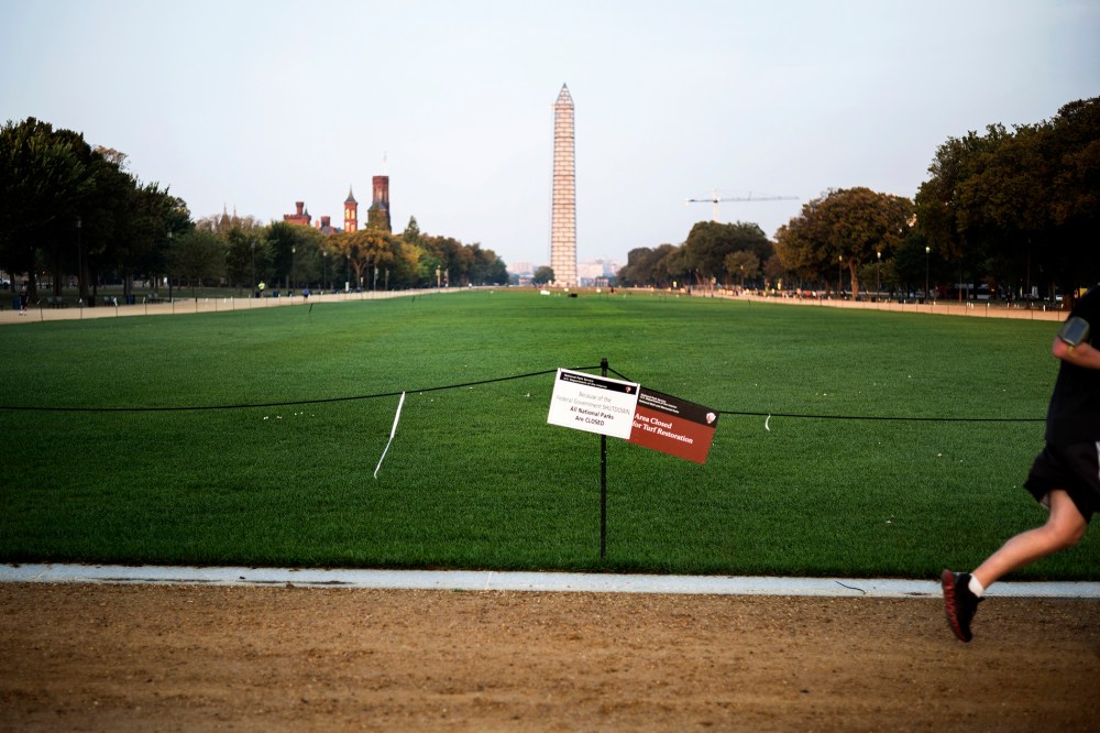 A man runs through a closed National Mall in Washington, DC, Oct 3, 2013.