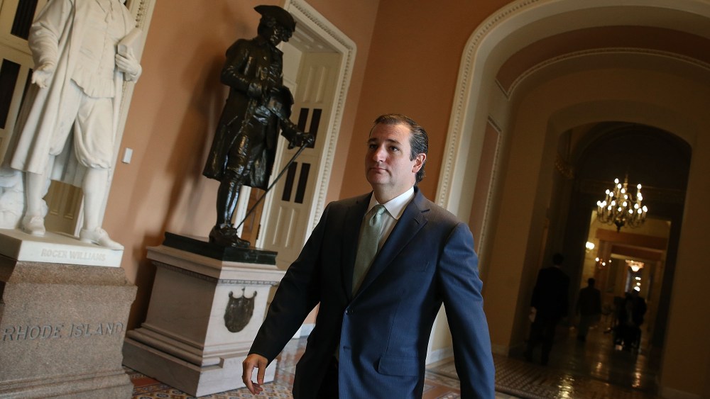 Sen. Ted Cruz (R-TX) walks through the U.S. Capitol, October 3, 2013 in Washington, DC.
