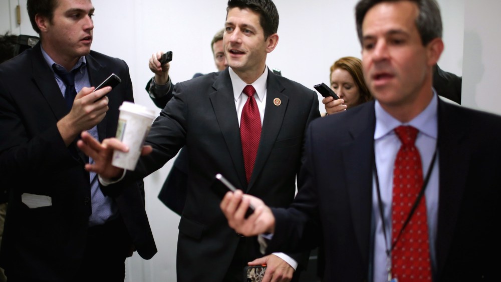 House Budget Committee Chairman Paul Ryan (R-WI) (C) heads for a House Republican caucus meeting at the U.S. Capitol on Oct. 4, 2013 in Washington, DC.