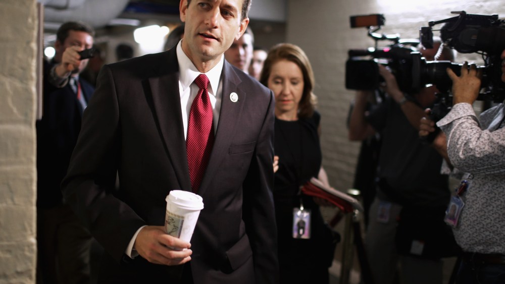 House Budget Committee Chairman Paul Ryan (R-WI) heads for a House Republican caucus meeting at the U.S. Capitol October 4, 2013 in Washington, DC.