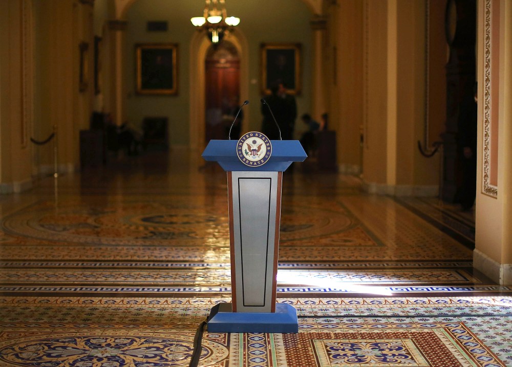 A podium stands where Senate Democrats and Republicans were scheduled to talk to the media after their policy luncheon meetings at the U.S. Capitol on Oct. 8, 2013 in Washington, DC.