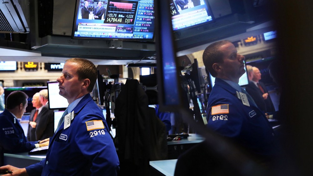 Traders work on the floor of the New York Stock Exchange minutes before the closing bell on Oct. 8, 2013 in New York City.