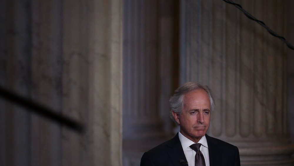 Sen. Bob Corker (R-TN) does a television interview at the U.S. Capitol on Oct. 9, 2013 in Washington, DC.