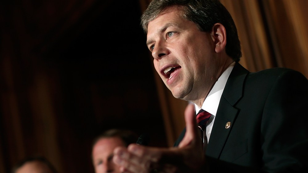 U.S. Sen. Mark Begich (D-AK) (R) speaks at a press conference at the U.S. Capitol on Oct. 9, 2013 in Washington, DC.