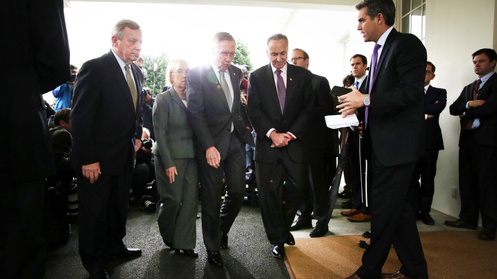 U.S. Senate Democrats leave after a meeting between President Barack Obama at the White House October 10, 2013.
