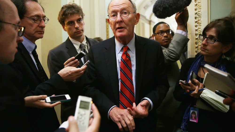 U.S. Sen. Lamar Alexander (R-TN) speaks to members of the media at the Capitol, Oct. 11, 2013.