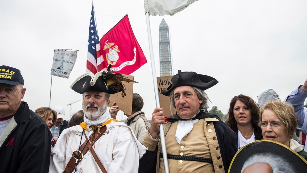 A crowd gathers at the World War Two Memorial to support a rally centered around reopening national memorials closed by the government shutdown, on Oct. 13, 2013 in Washington, DC.