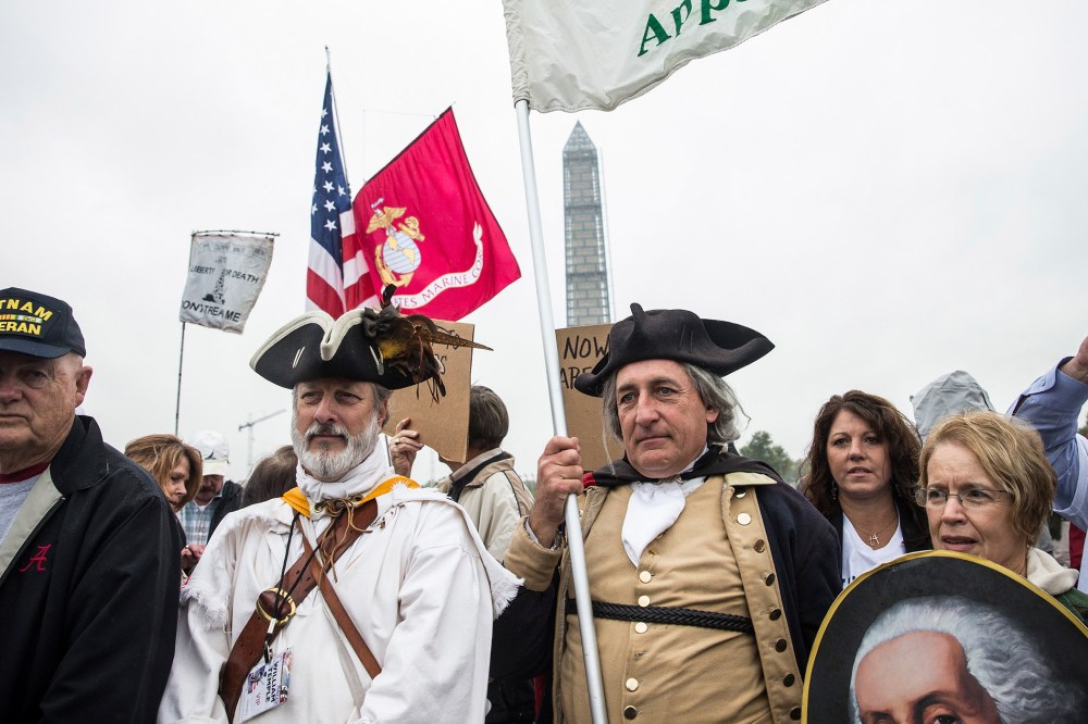 A crowd gathers at the World War Two Memorial to support a rally centered around reopening national memorials closed by the government shutdown, on Oct. 13, 2013 in Washington, DC.