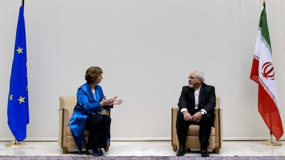 EU High Representative for Foreign Affairs Catherine Ashton (L) speaks with Iranian Foreign Minister Mohammad Javad Zarif during a photo-op prior the start of two days of closed-door nuclear talks
