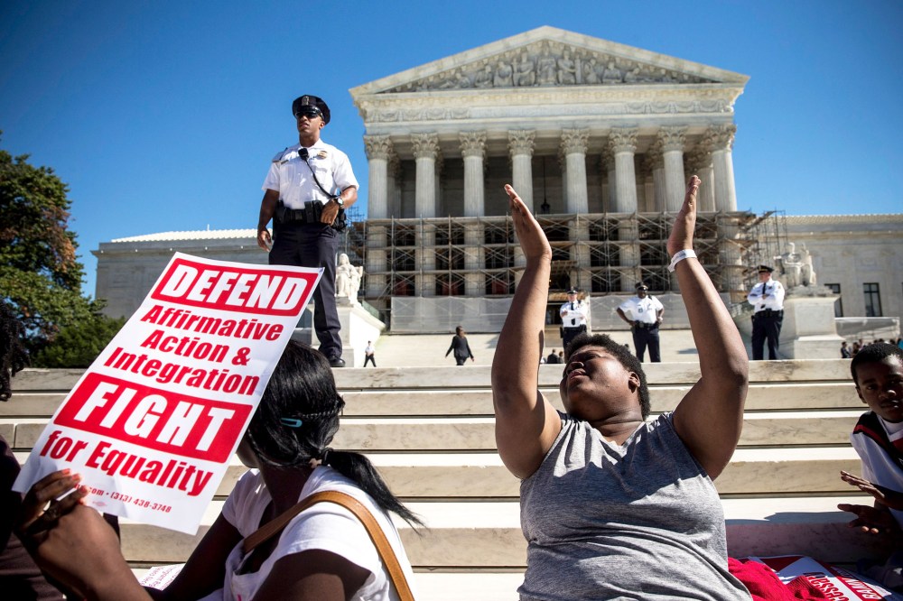 Students protest in support of affirmative action outside the Supreme Court, October 15, 2013 in Washington, DC.