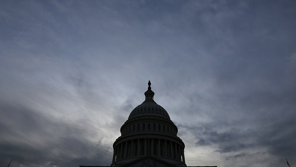 The U.S. Capitol is shown at sunset in Washington, D.C.