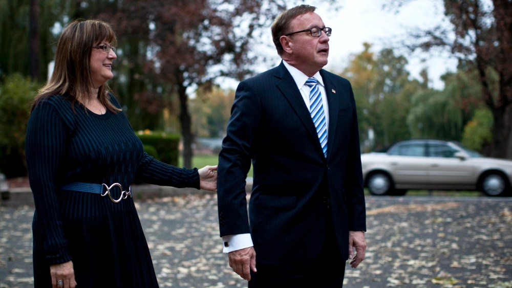 New Jersey U.S. Senate candidate Steve Lonegan and his wife Lorraine Rossi Lonegan arrives at a polling center on October 16, 2013 in Bogota, New Jersey.