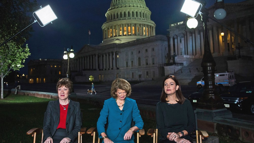 Sen. Susan Collins, Sen. Lisa Murkowski, and Sen. Kelly Ayotte prepare to appear on national television on the morning of October 16, 2013 in Washington, DC.