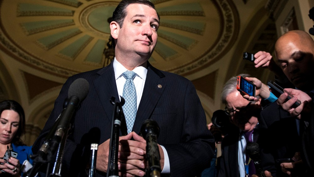 Sen. Ted Cruz (R-TX) waits to speak with reporters on Capitol Hill on Oct. 16, 2013 in Washington, DC.