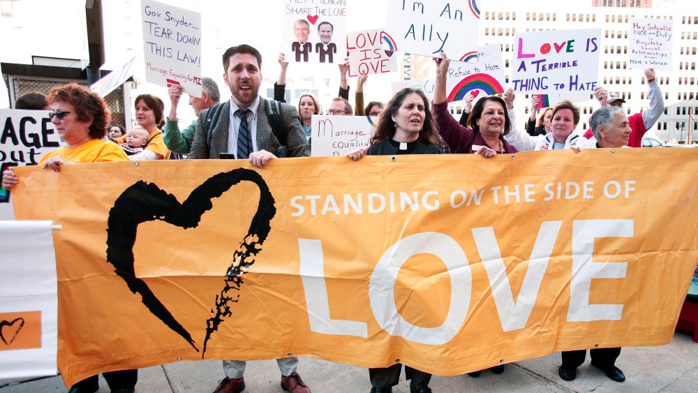 People in favor of same-sex marriage rally at the U.S. Courthouse, October 16, 2013 in Detroit, Michigan.
