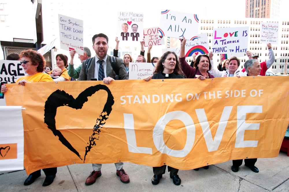 People in favor of same-sex marriage rally at the U.S. Courthouse, October 16, 2013 in Detroit, Michigan.
