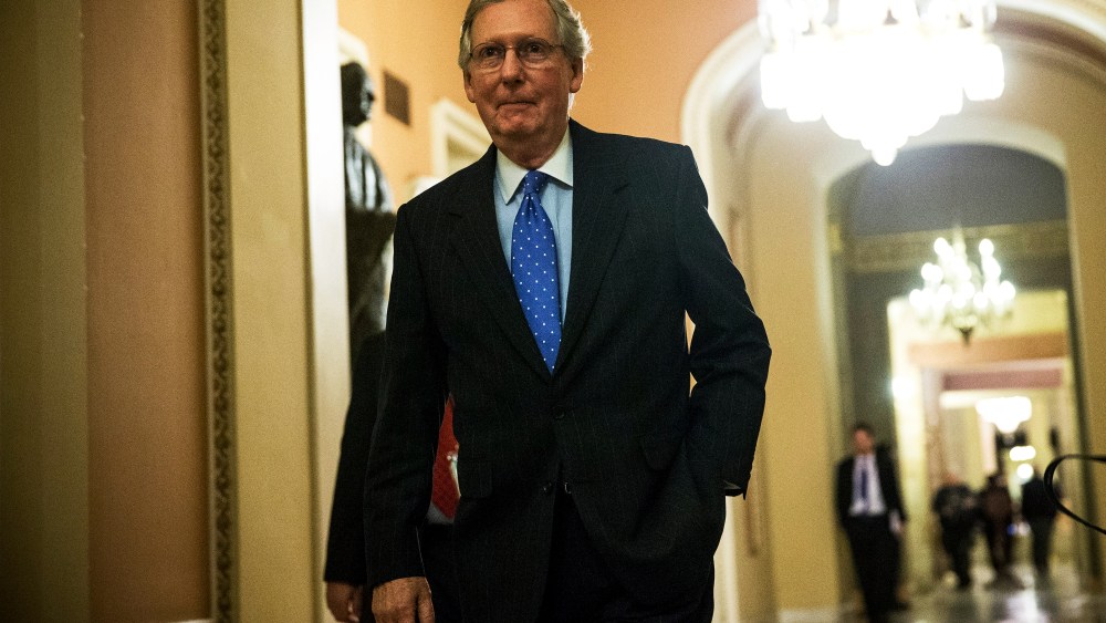U.S. Senate Minority Leader Sen. Mitch McConnell walks to the Senate Chamber at the U.S. Capitol October 16, 2013 in Washington, DC.