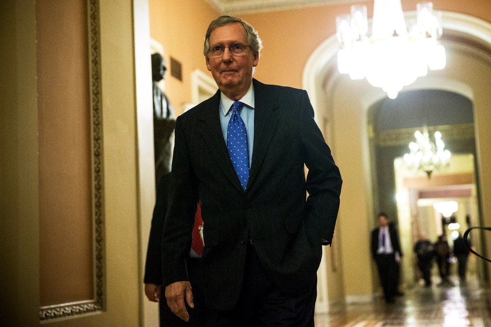 U.S. Senate Minority Leader Sen. Mitch McConnell walks to the Senate Chamber at the U.S. Capitol October 16, 2013 in Washington, DC.
