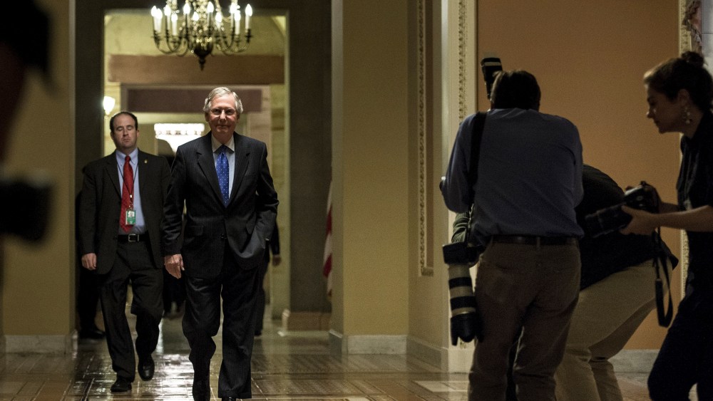 Senate Minority Leader Senator Mitch McConnell walks to a vote on Capitol Hill October 16, 2013 in Washington, DC.