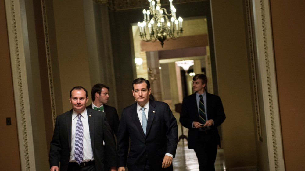 Senator Ted Cruz walks to a vote on Capitol Hill October 16, 2013 in Washington, DC.