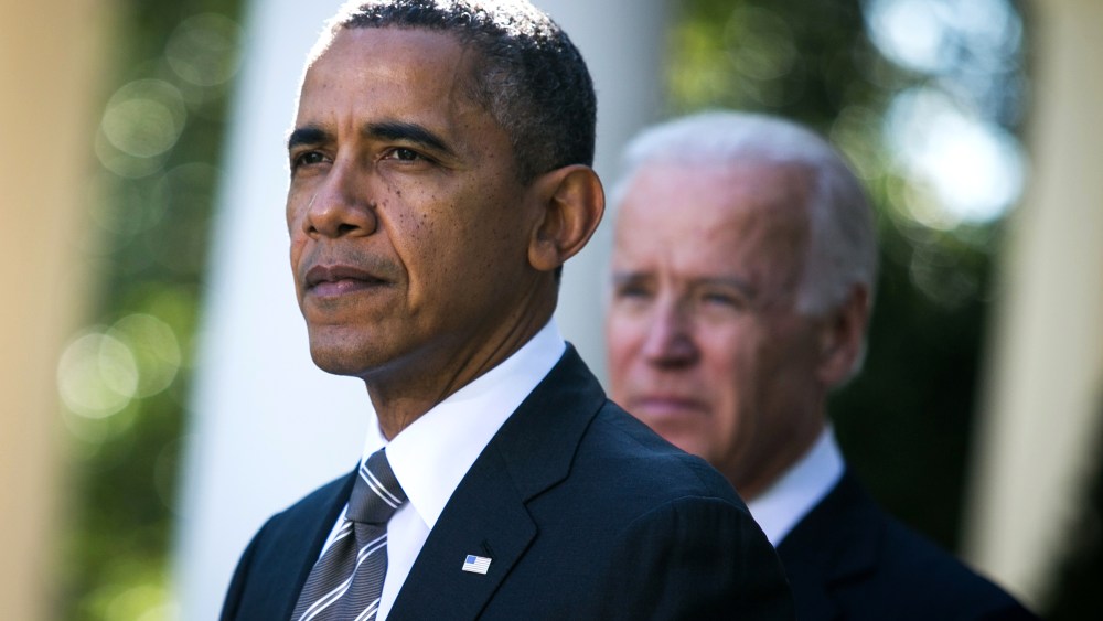 U.S. President Barack Obama and U.S. Vice President Joe Biden are seen during an event to introduce Jeh Johnson as the president's nominee to be the next Secretary of the Department of Homeland Security