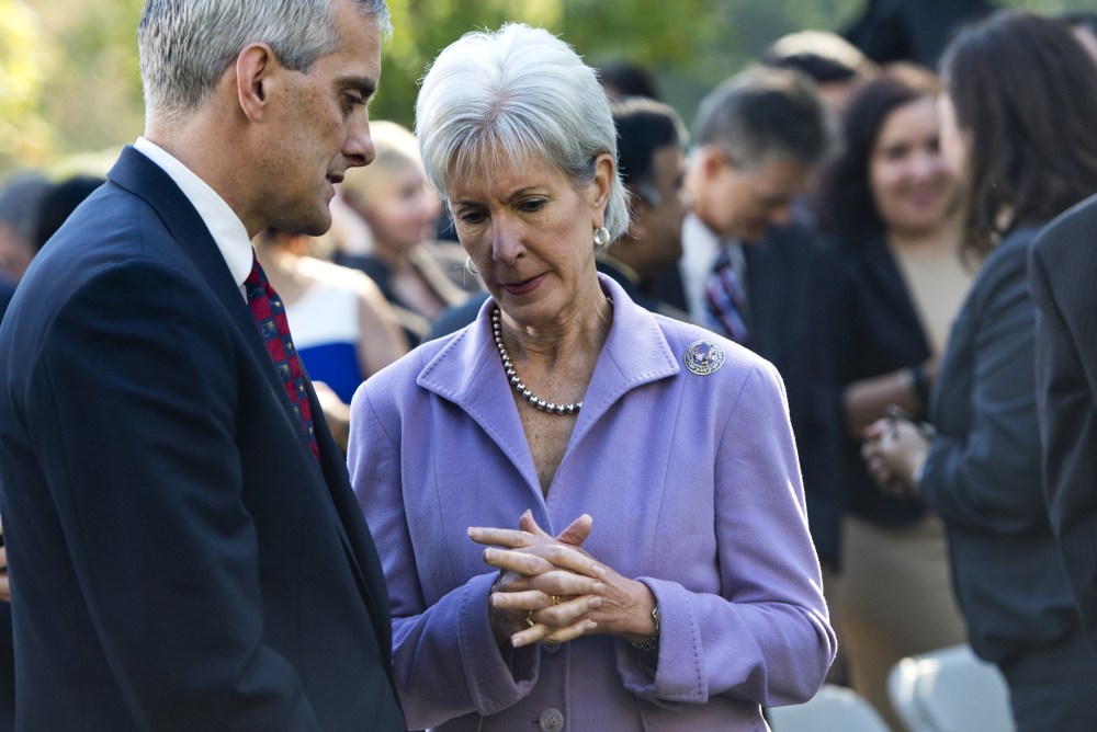 US Secretary of Health and Human Services Kathleen Sebelius speaks with White House Chief of Staff Denis McDonough following an event with President Barack Obama to speak about the Affordable Care Act, the new healthcare laws, in the Rose Garden of the Wh