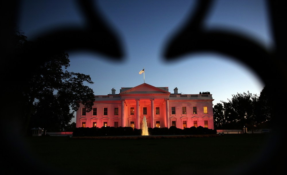 The White House is bathed in pink light for National Breast Cancer Awareness Month on Oct. 24, 2013 in Washington, DC.