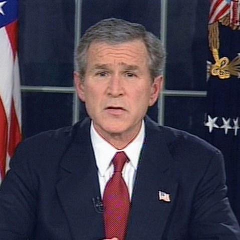 File Photo: (VIDEO CAPTURE) In this image from video, U.S. President George W. Bush announces that the U.S. military struck at "targets of opportunity" in Iraq March 19, 2003 in Washington, DC. Air defense sirens and anti-aircraft fire was reported...