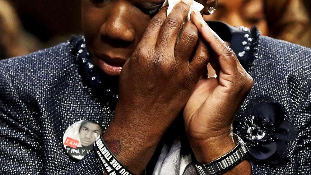 Sybrina Fulton wipes her eyes during a Senate Judiciary Committee hearing on "Stand Your Ground" laws October 29, 2013 in Washington, DC.