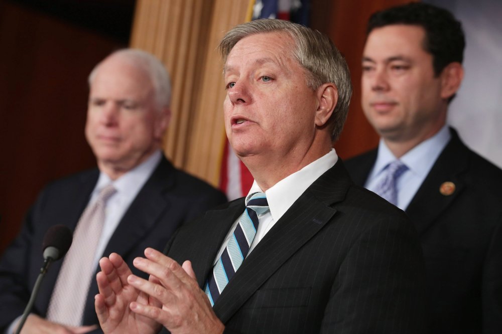 Image: Graham, McCain, GOP Senators Hold News Conference On Benghazi