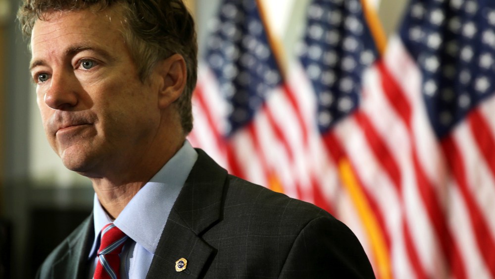 Sen. Rand Paul (R-KY) waits for the beginning of a news conference, Nov. 6, 2013, on Capitol Hill in Washington, DC.