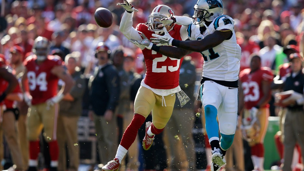 Tarell Brown #25 of the San Francisco 49ers breaks up a pass intended for Brandon LaFell #11 of the Carolina Panthers during a regular season meeting at Candlestick Park, Nov. 10, 2013 in San Francisco, Calif.