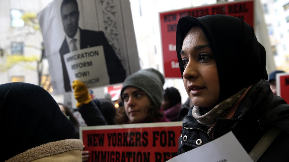 Immigration Reform Advocates March To Pressure Republican Congressman
