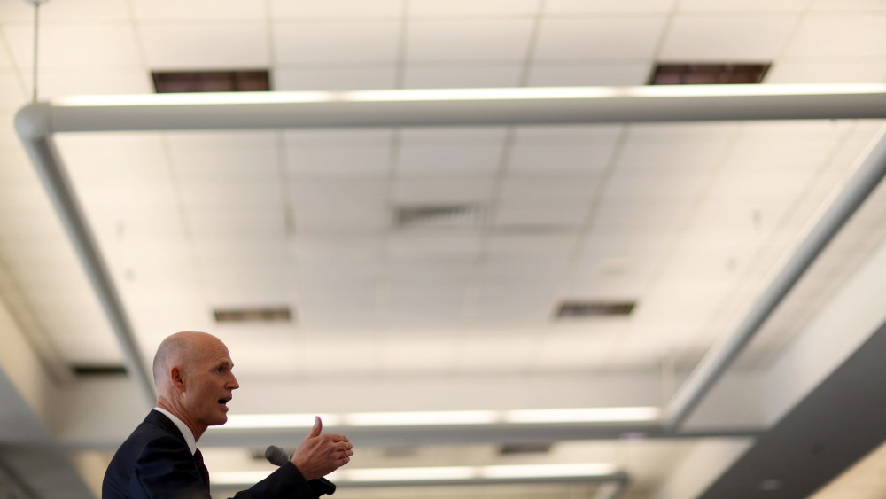 Florida Governor Rick Scott gives a speech during a meeting at PortMiami on November 12, 2013 in Miami, Florida.