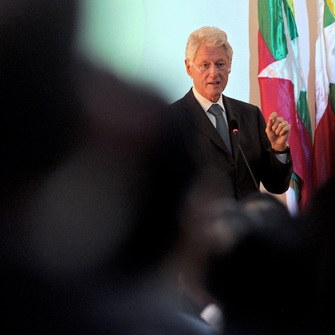 Former US President Bill Clinton talks in Yangon on November 14, 2013.