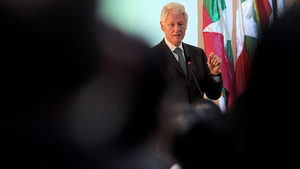 Former US President Bill Clinton talks in Yangon on November 14, 2013.