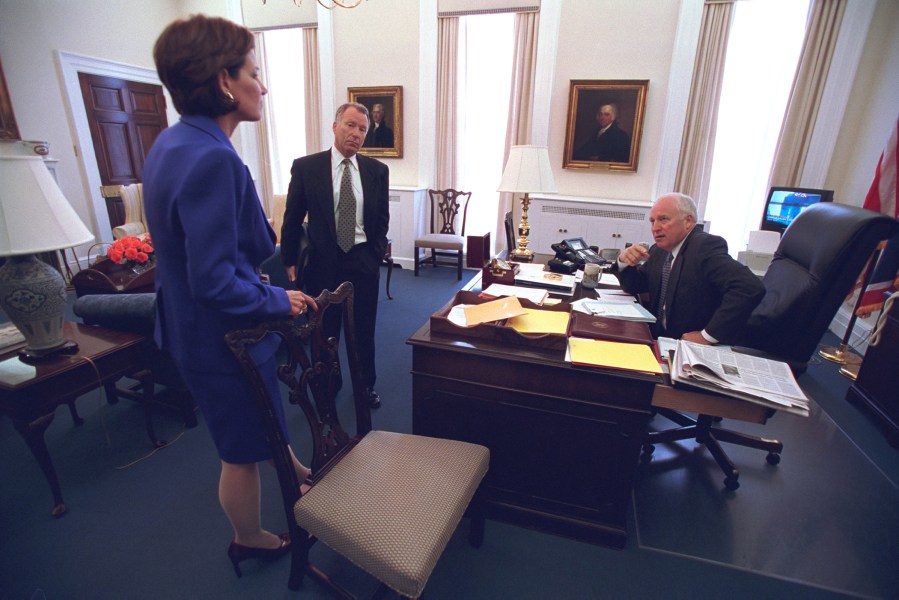 Vice President Cheney talks with advisers I. Lewis 