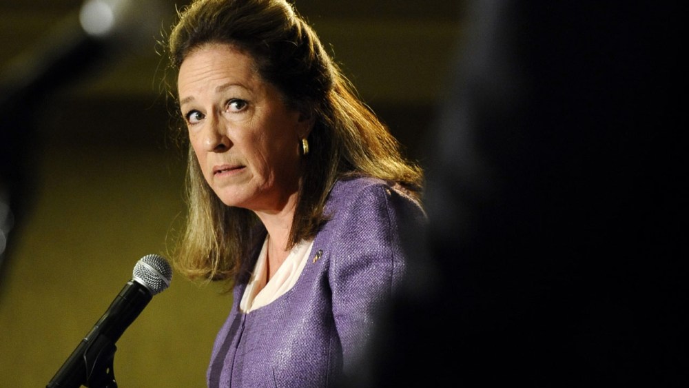 Democratic candidate Elizabeth Colbert Busch, left, looks at former South Carolina Gov. Mark Sanford as she answers a question during the 1st Congressional District debate on Monday, April 29, 2013 in Charleston S.C. (AP Photo/Rainier Ehrhardt)