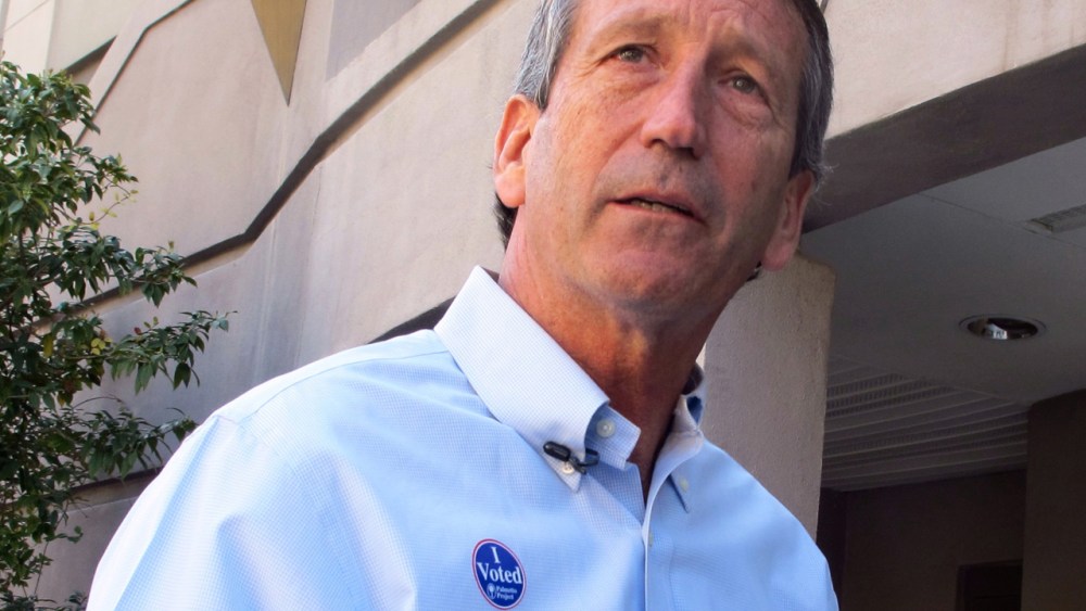 Former South Carolina Gov. Mark Sanford answers questions from reporters after voting in Charleston, S.C., on Tuesday, April 2, 2013. (AP Photo/Bruce Smith)