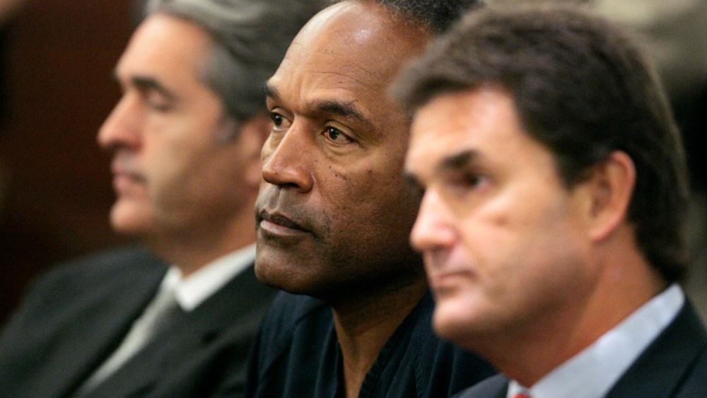 O.J. Simpson appears in court with his attorneys in Las Vegas, Sept. 19, 2007. (Photo by Barry Sweet/ZUMA)