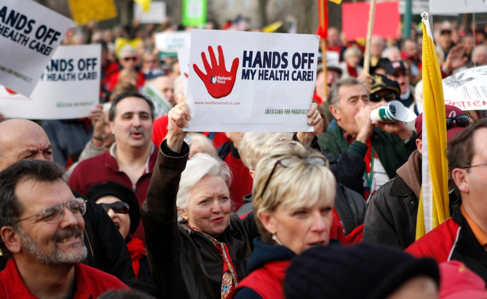 Image: Demonstrators protest healthcare legislation at the Capitol in Washington