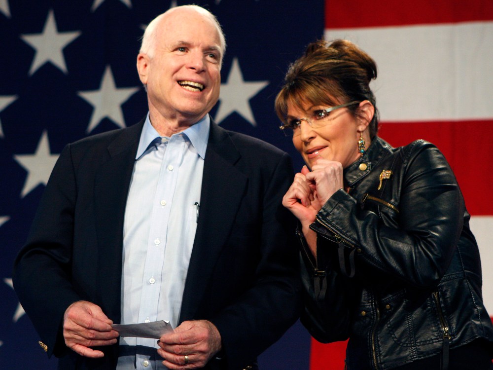 Senator John McCain and former Alaska governor and vice presidential candidate Sarah Palin during a campaign rally at the Pima County Fairgrounds in Tucson, Arizona March 26, 2010. (Photo by Joshua Lott/Reuters)