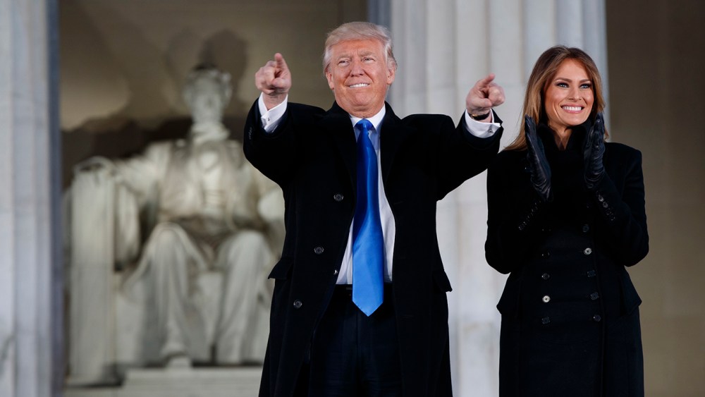 President-elect Donald Trump and his wife Melania Trump arrive to the "Make America Great Again Welcome Concert" at the Lincoln Memorial, Jan. 19, 2017, in Washington. (Photo by Evan Vucci/AP)