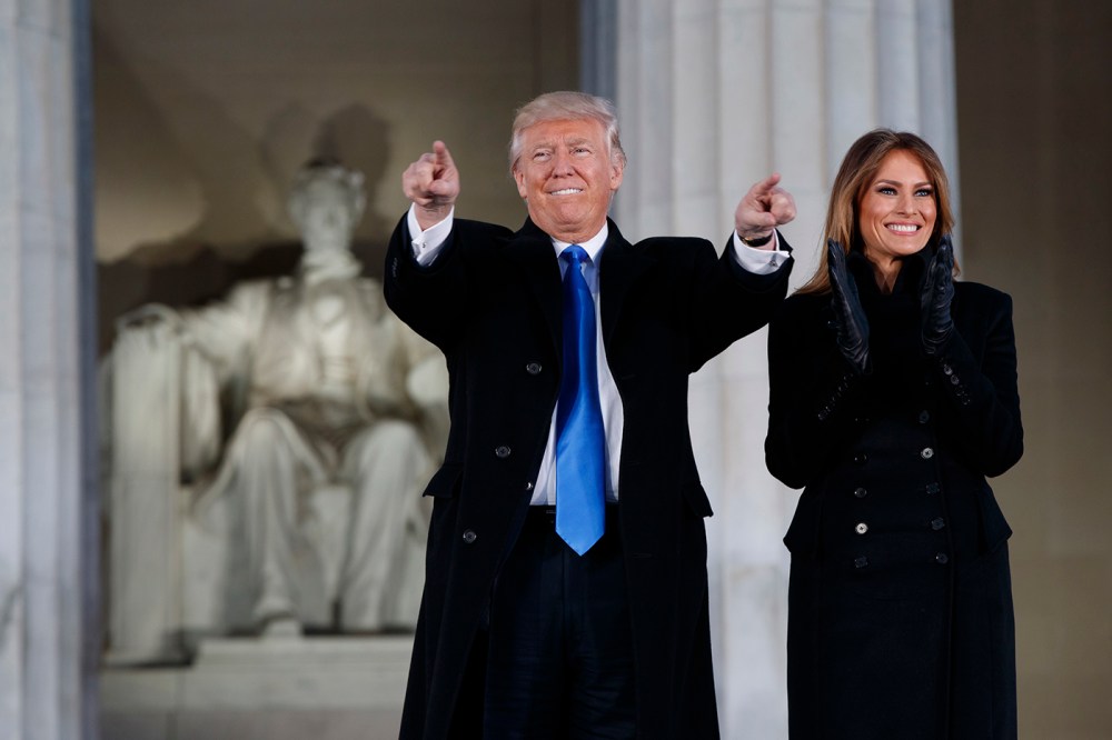 President-elect Donald Trump and his wife Melania Trump arrive to the "Make America Great Again Welcome Concert" at the Lincoln Memorial, Jan. 19, 2017, in Washington. (Photo by Evan Vucci/AP)