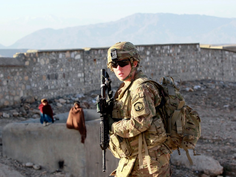 File Photo: SPC Erica Taliaferro, a U.S. female soldier from 549th MP Company, Task Force Bronco patrols in Pachir wa Agam district in Nangarhar province, eastern Afghanistan March 5, 2012. (Photo by Erik De Castro/Reuters, File)