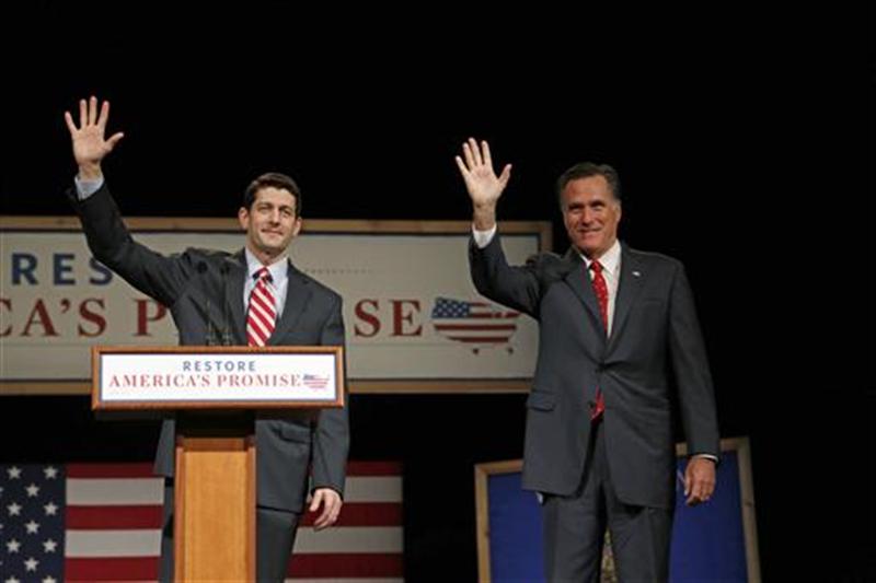 House Budget Chairman Paul Ryan introduces Republican presidential candidate Mitt Romney as he addresses supporters at Lawrence University during a campaign stop in Appleton, Wisconsin, March 30, 2012.