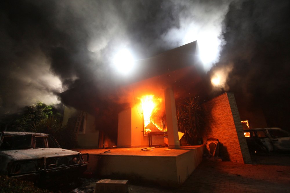 The U.S. Consulate in Benghazi is seen in flames during a protest by an armed group in this file photo taken September 11, 2012.